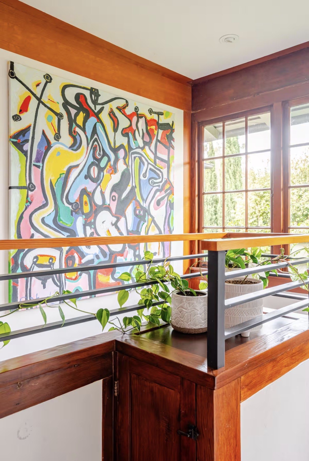 Large abstract art on a stair landing